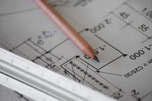 image of a pencil and blueprint